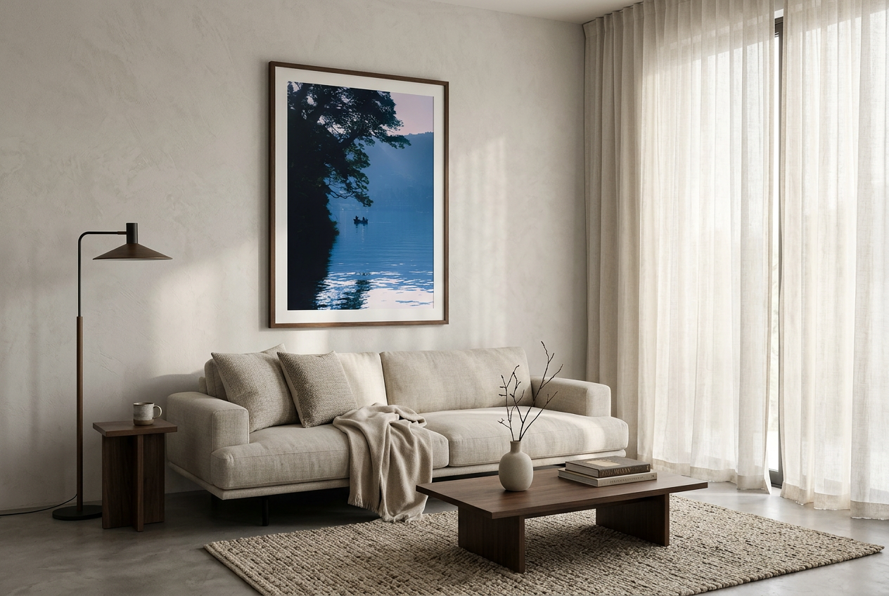 This minimalist lake photography print features a serene blue-toned landscape with a boat silhouette, making it perfect for calm wall art, Japandi decor, and modern minimalist interiors. Ideal for bedrooms, living rooms, and offices, this premium fine art print brings a peaceful, reflective atmosphere through soft blue hues and natural composition.
