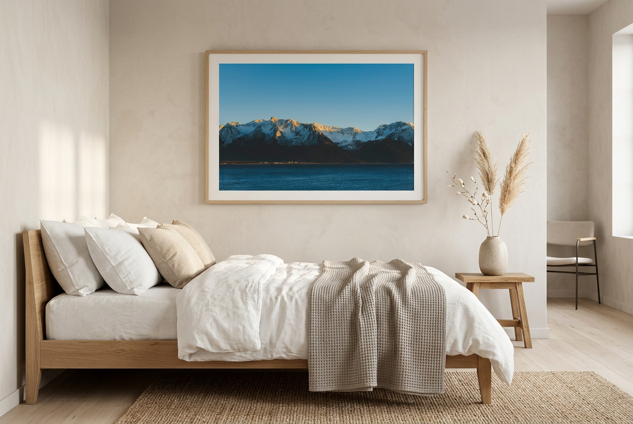 This calming mountain and ocean wall art print features a minimalist landscape with blue tones and soft natural light. Perfect for modern, coastal, or Scandinavian-inspired interiors, it brings a peaceful atmosphere to any space.