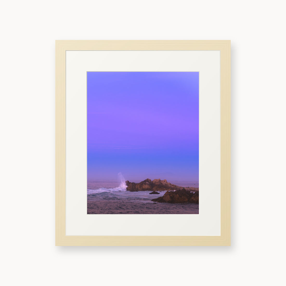 
Bonbon Beach — 11x14, maple frame. A breaking wave and rocky shoreline beneath a broad violet sky.