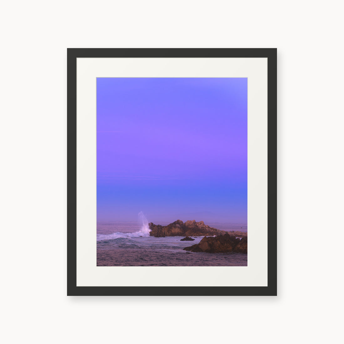 
Bonbon Beach — 16x20, black frame. A breaking wave and rocky shoreline beneath a broad violet sky.
