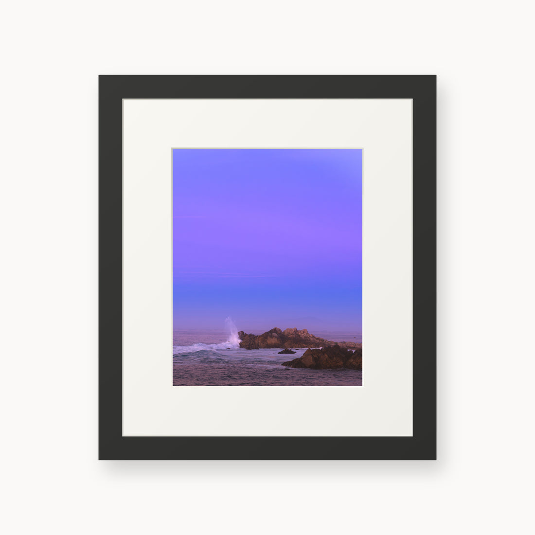 
Bonbon Beach — 8x10, black frame. A breaking wave and rocky shoreline beneath a broad violet sky.