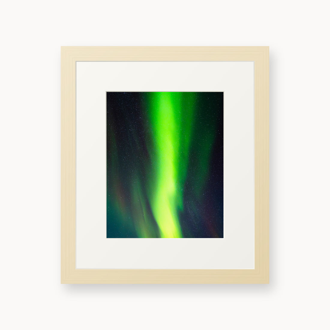 
Cosmic Curtain — 8x10, maple frame. A vivid green aurora crossing a star-filled night sky.
