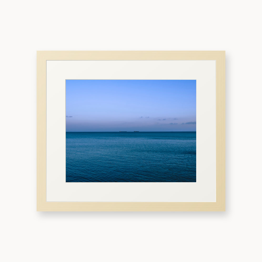 
Deux Bateaux Passants — 11x14, maple frame. Two distant vessels along the horizon above a calm blue sea.
