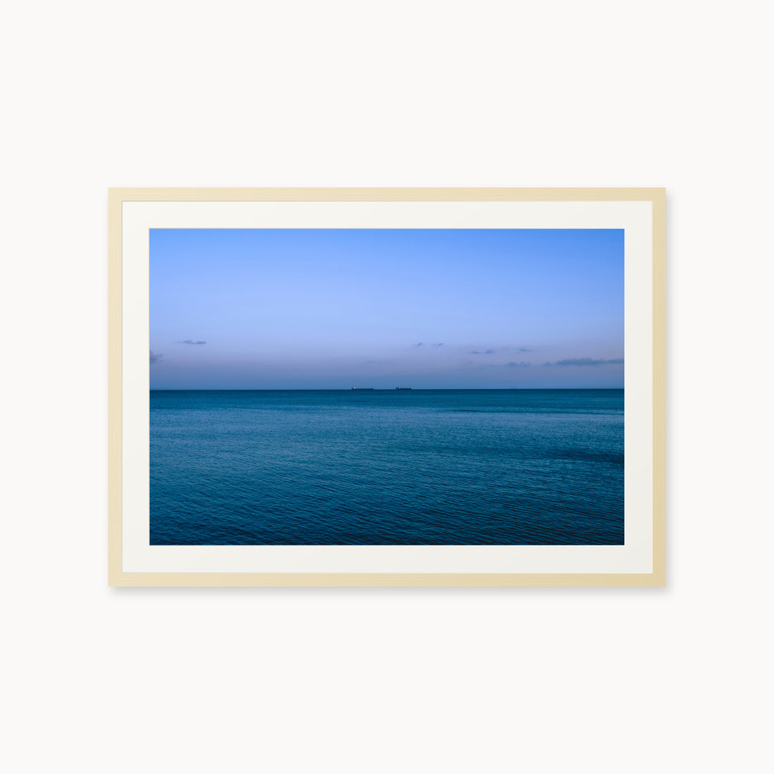 
Deux Bateaux Passants — 24x36, maple frame. Two distant vessels along the horizon above a calm blue sea.