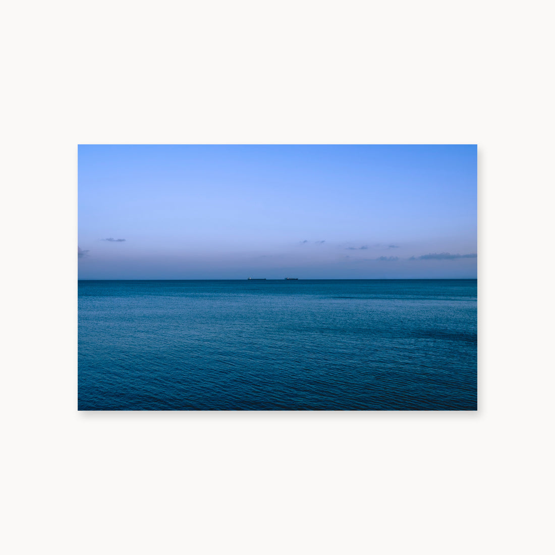 
Deux Bateaux Passants — 24x36, unframed. Two distant vessels along the horizon above a calm blue sea.