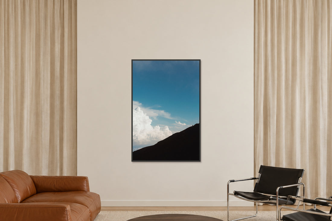
Solitary Ascent fine art photograph in a 40×60 black frame in a sitting room.