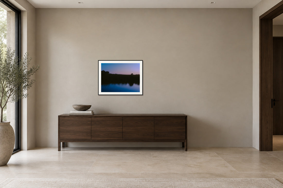 
What Lays Beneath fine art print, 30×40 in black frame, hallway mockup