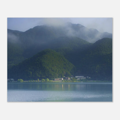 This misty lake mountain landscape wall art print captures serene blue tones and tranquil natural scenery, making it ideal for minimalist home decor. Designed for calming interiors, this fine art nature photography print enhances spaces with peaceful lake reflections, foggy mountain layers, and soft atmospheric light. A perfect choice for those seeking calming wall art, nature-inspired decor, or serene landscape prints for modern homes.