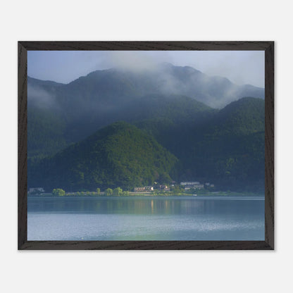 This misty lake mountain landscape wall art print captures serene blue tones and tranquil natural scenery, making it ideal for minimalist home decor. Designed for calming interiors, this fine art nature photography print enhances spaces with peaceful lake reflections, foggy mountain layers, and soft atmospheric light. A perfect choice for those seeking calming wall art, nature-inspired decor, or serene landscape prints for modern homes.