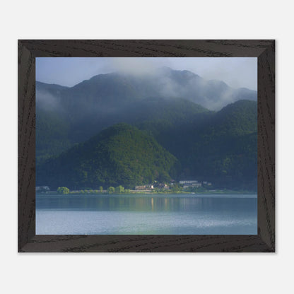 This misty lake mountain landscape wall art print captures serene blue tones and tranquil natural scenery, making it ideal for minimalist home decor. Designed for calming interiors, this fine art nature photography print enhances spaces with peaceful lake reflections, foggy mountain layers, and soft atmospheric light. A perfect choice for those seeking calming wall art, nature-inspired decor, or serene landscape prints for modern homes.